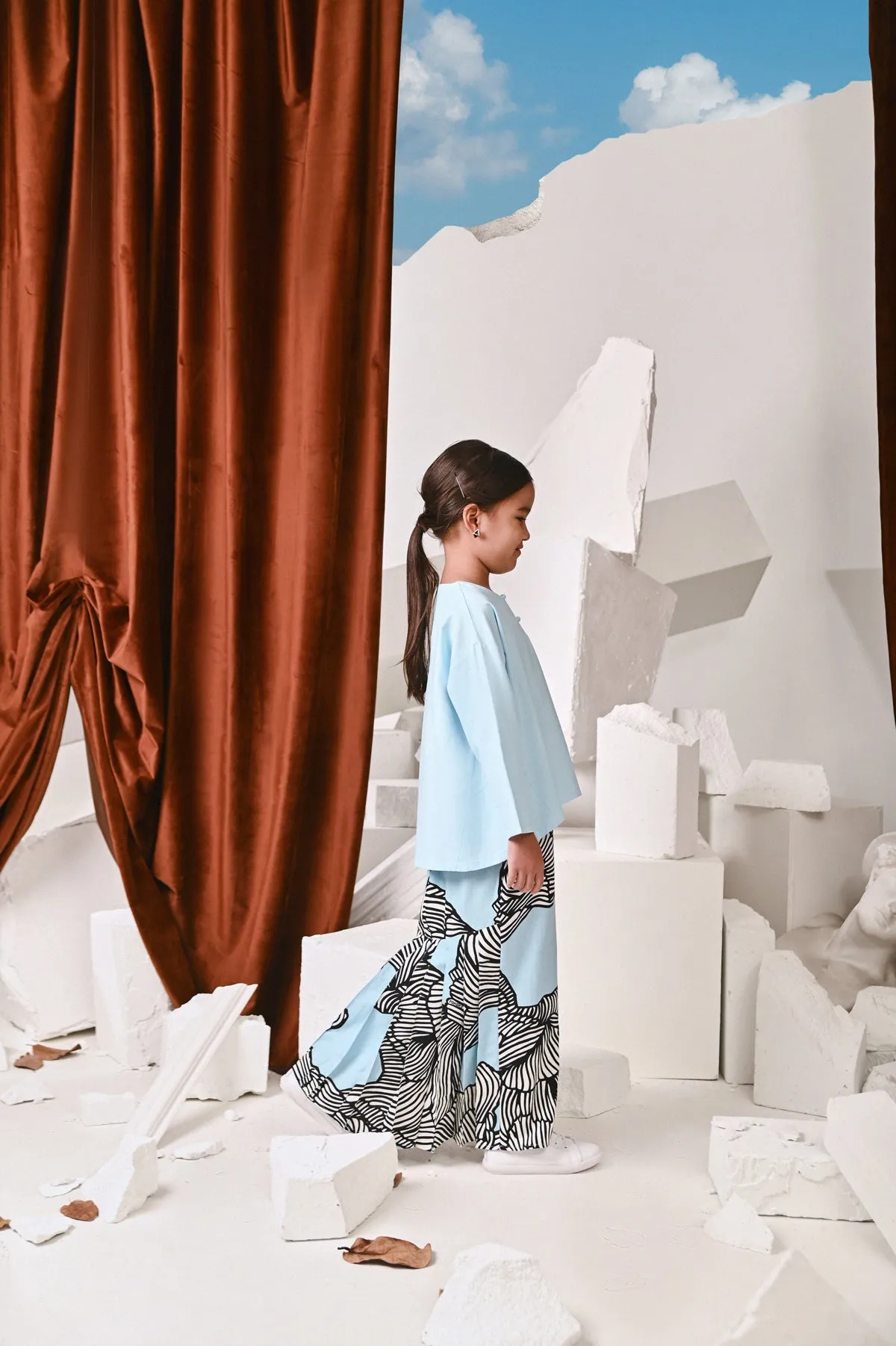 The Kita Menang Back Pleats Skirt - Rise