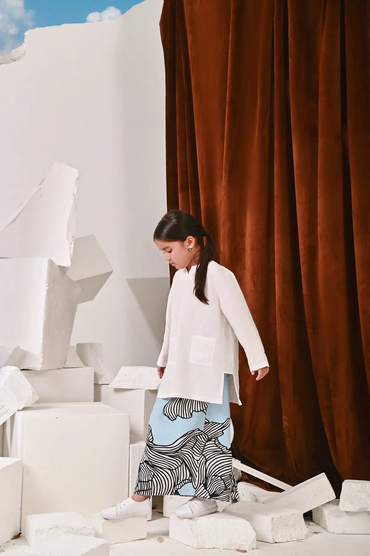 The Kita Menang Back Pleats Skirt - Rise