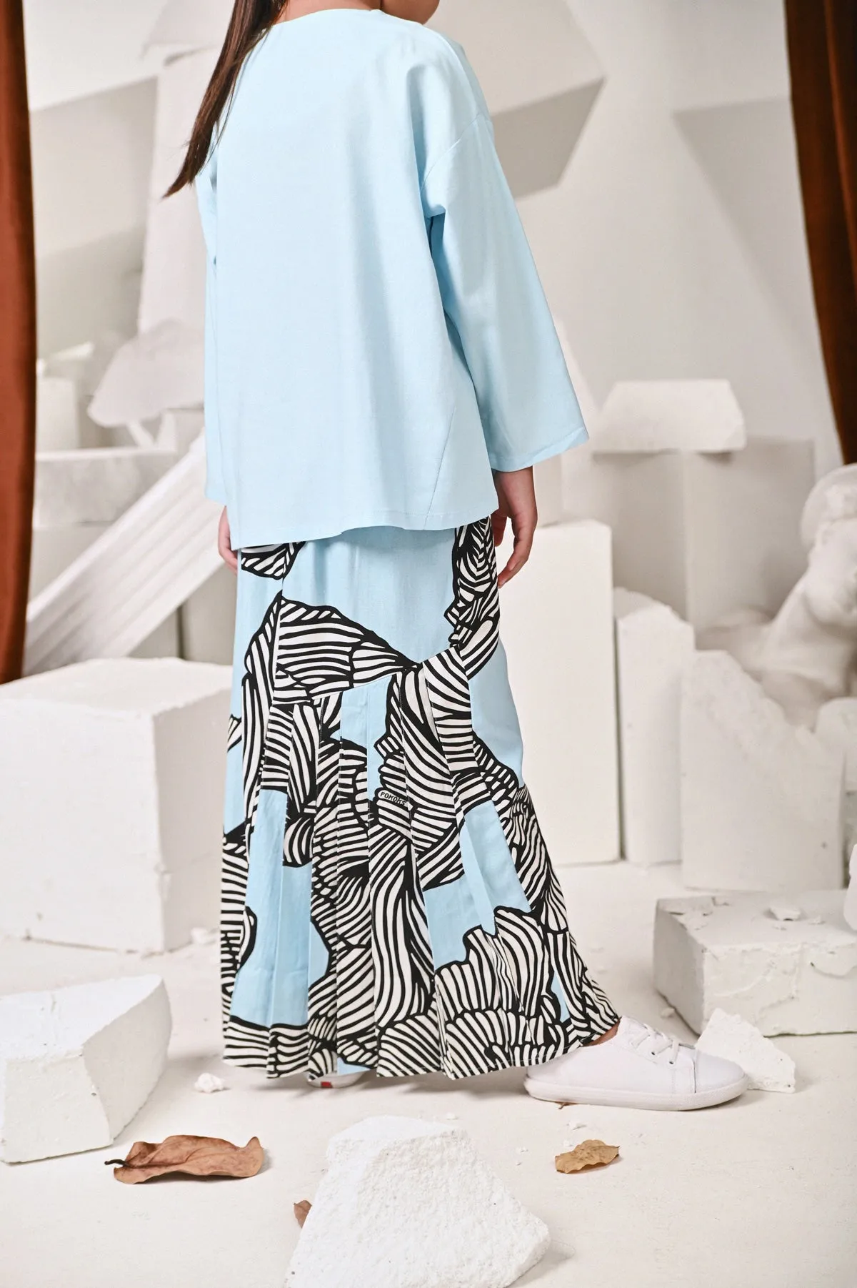 The Kita Menang Back Pleats Skirt - Rise