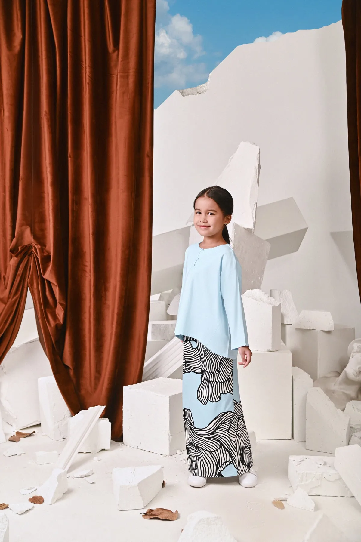 The Kita Menang Back Pleats Skirt - Rise