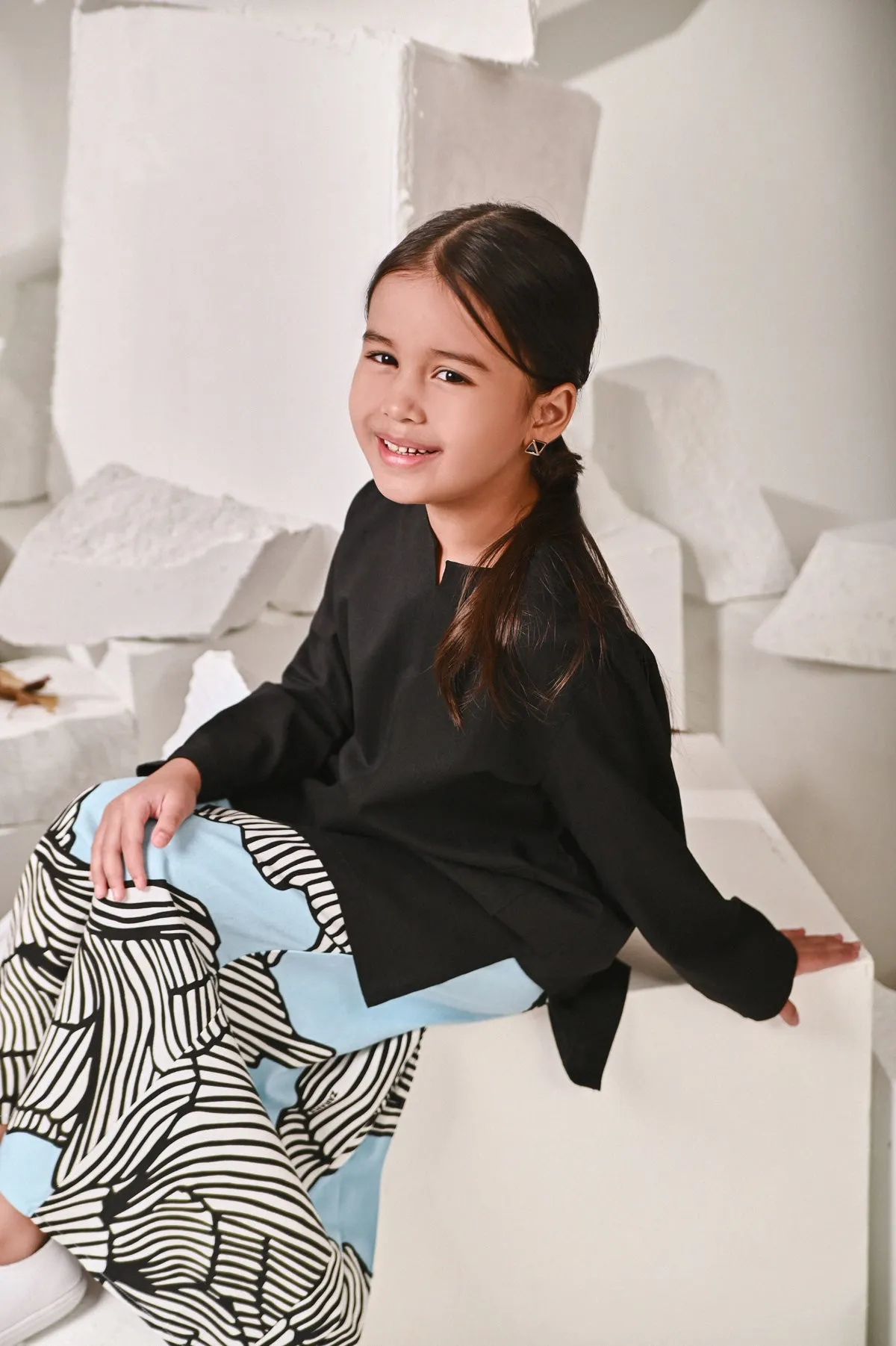 The Kita Menang Back Pleats Skirt - Rise