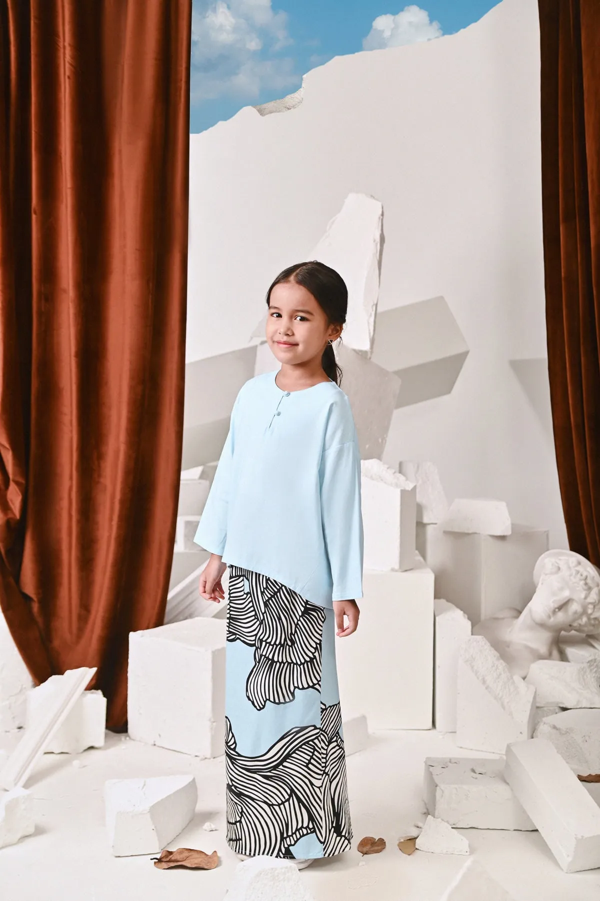 The Kita Menang Back Pleats Skirt - Rise