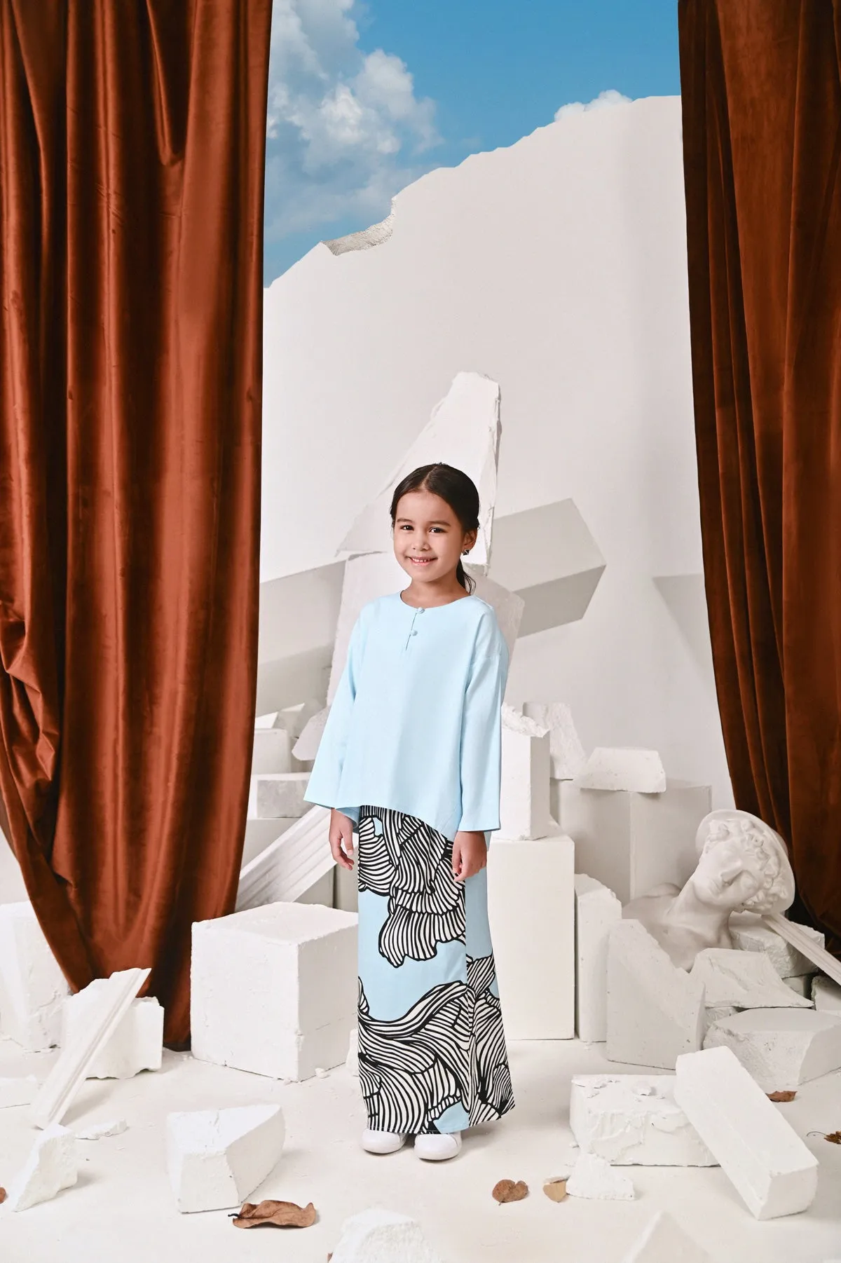 The Kita Menang Back Pleats Skirt - Rise