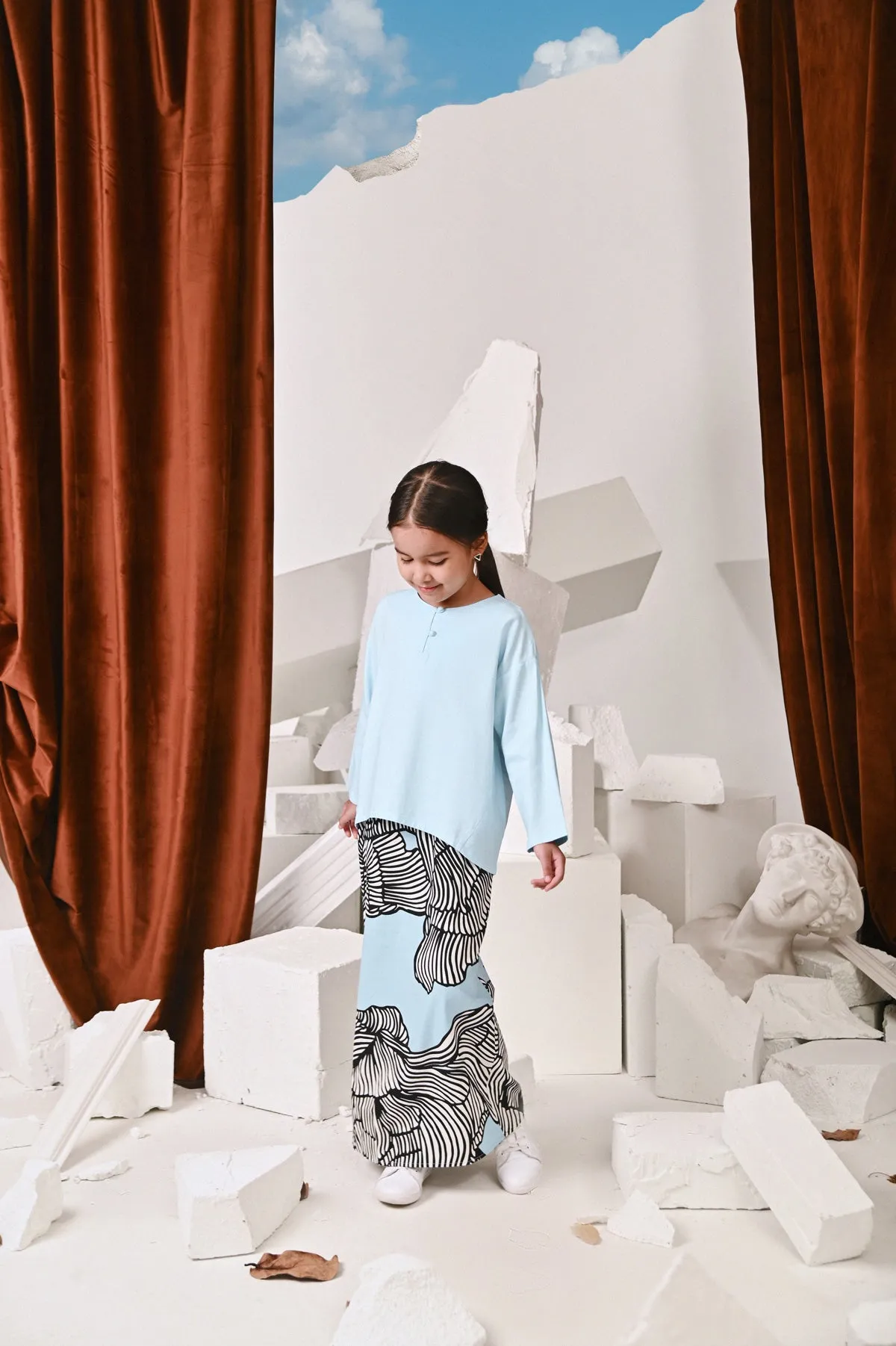 The Kita Menang Back Pleats Skirt - Rise