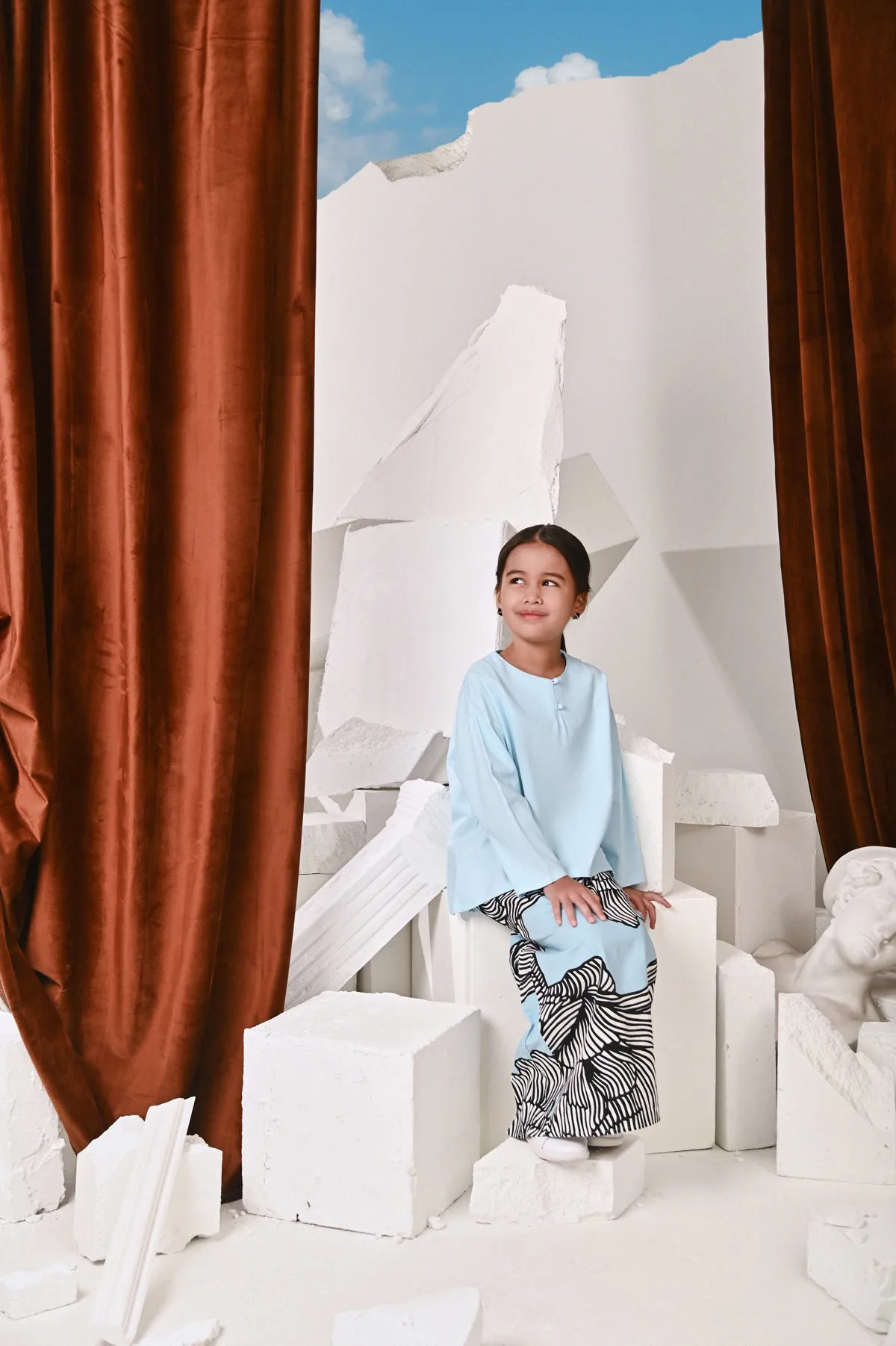 The Kita Menang Back Pleats Skirt - Rise