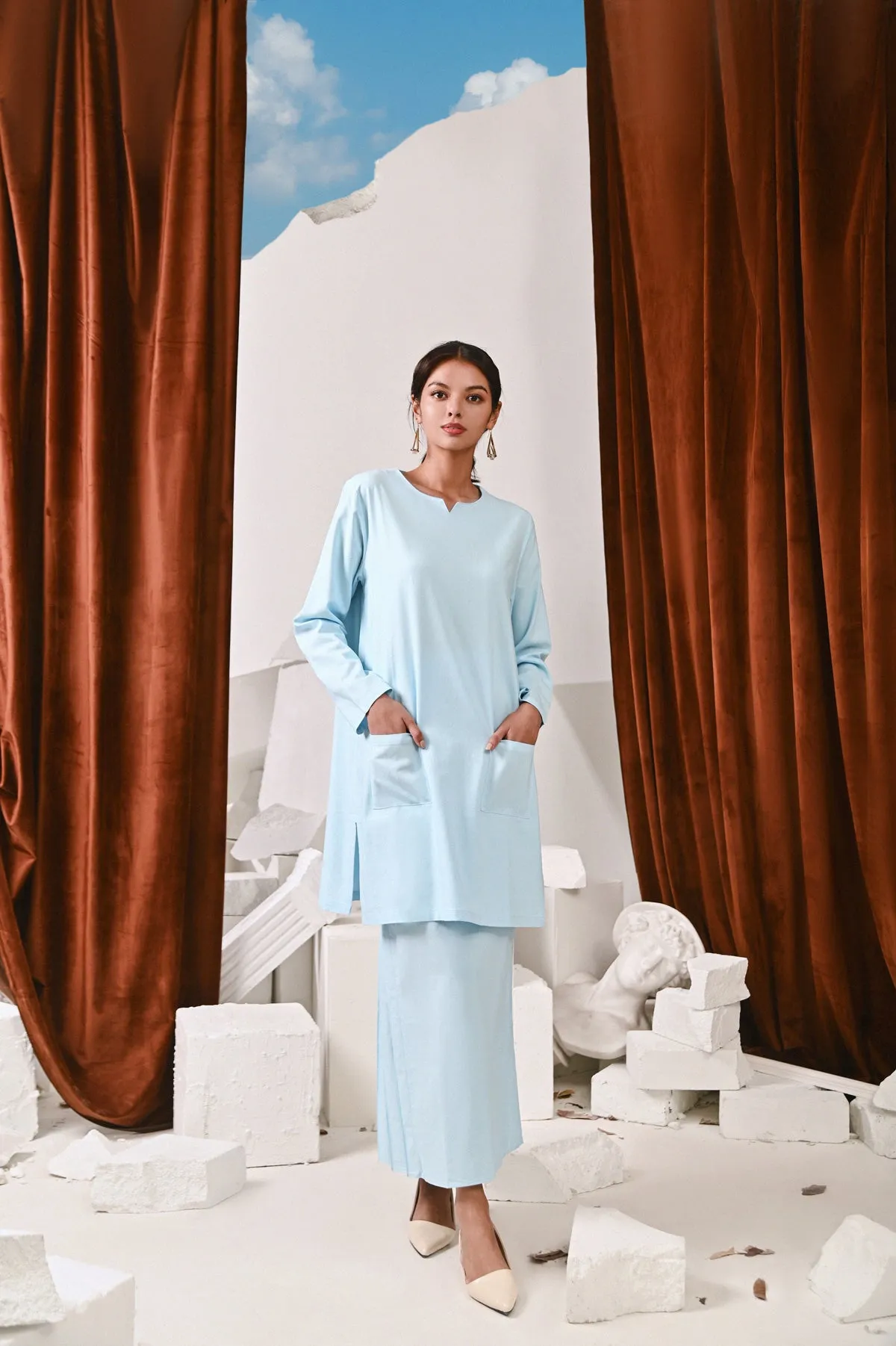 The Kita Menang Women Back Pleats Skirt - Light Blue