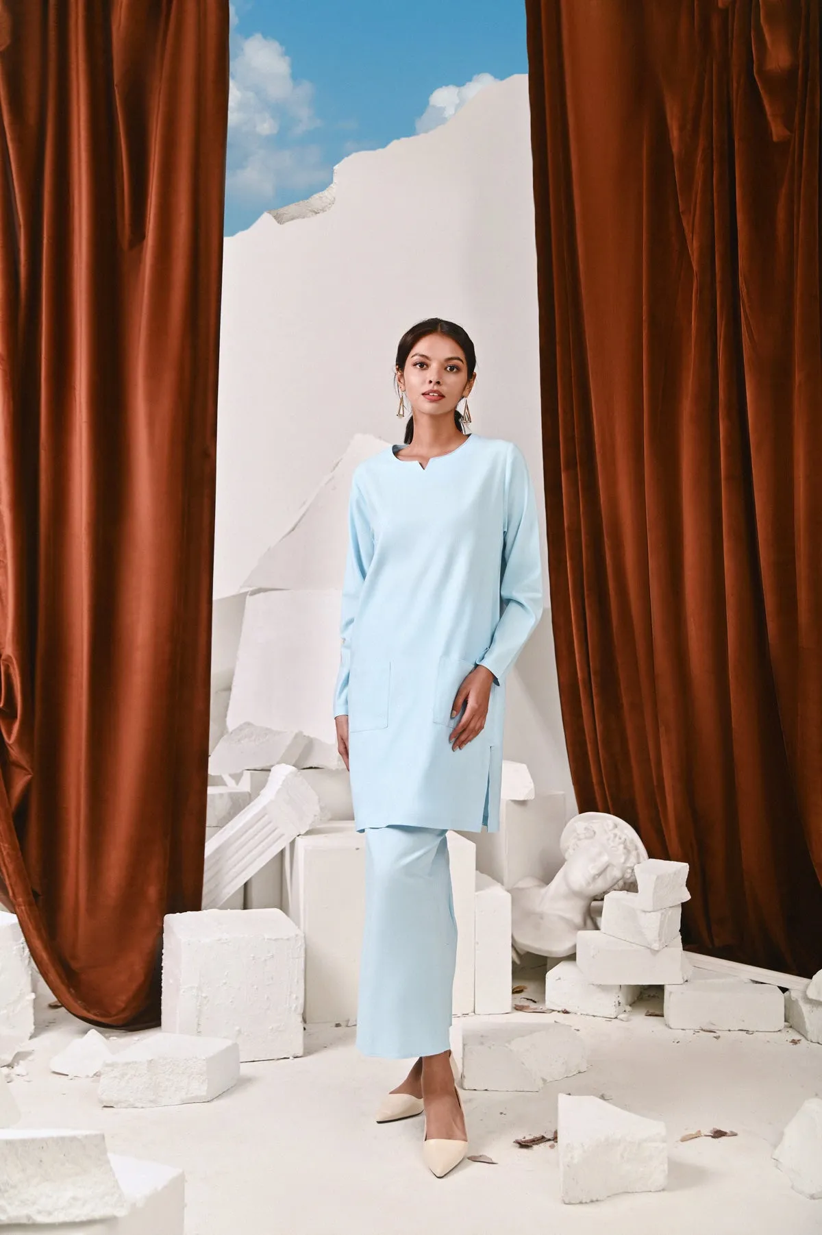 The Kita Menang Women Back Pleats Skirt - Light Blue