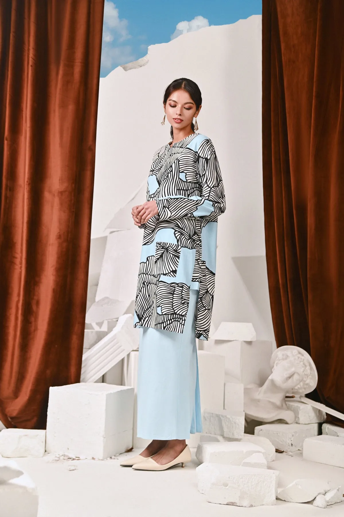The Kita Menang Women Back Pleats Skirt - Light Blue