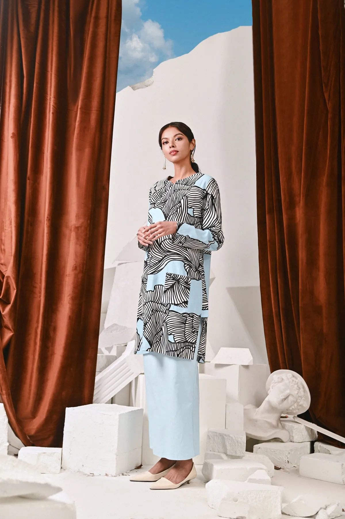 The Kita Menang Women Back Pleats Skirt - Light Blue