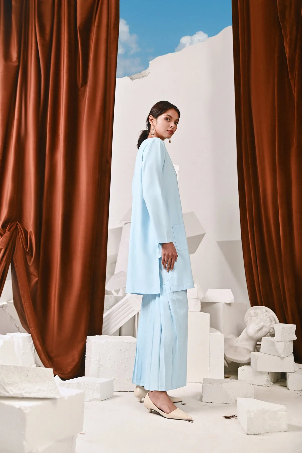The Kita Menang Women Back Pleats Skirt - Light Blue