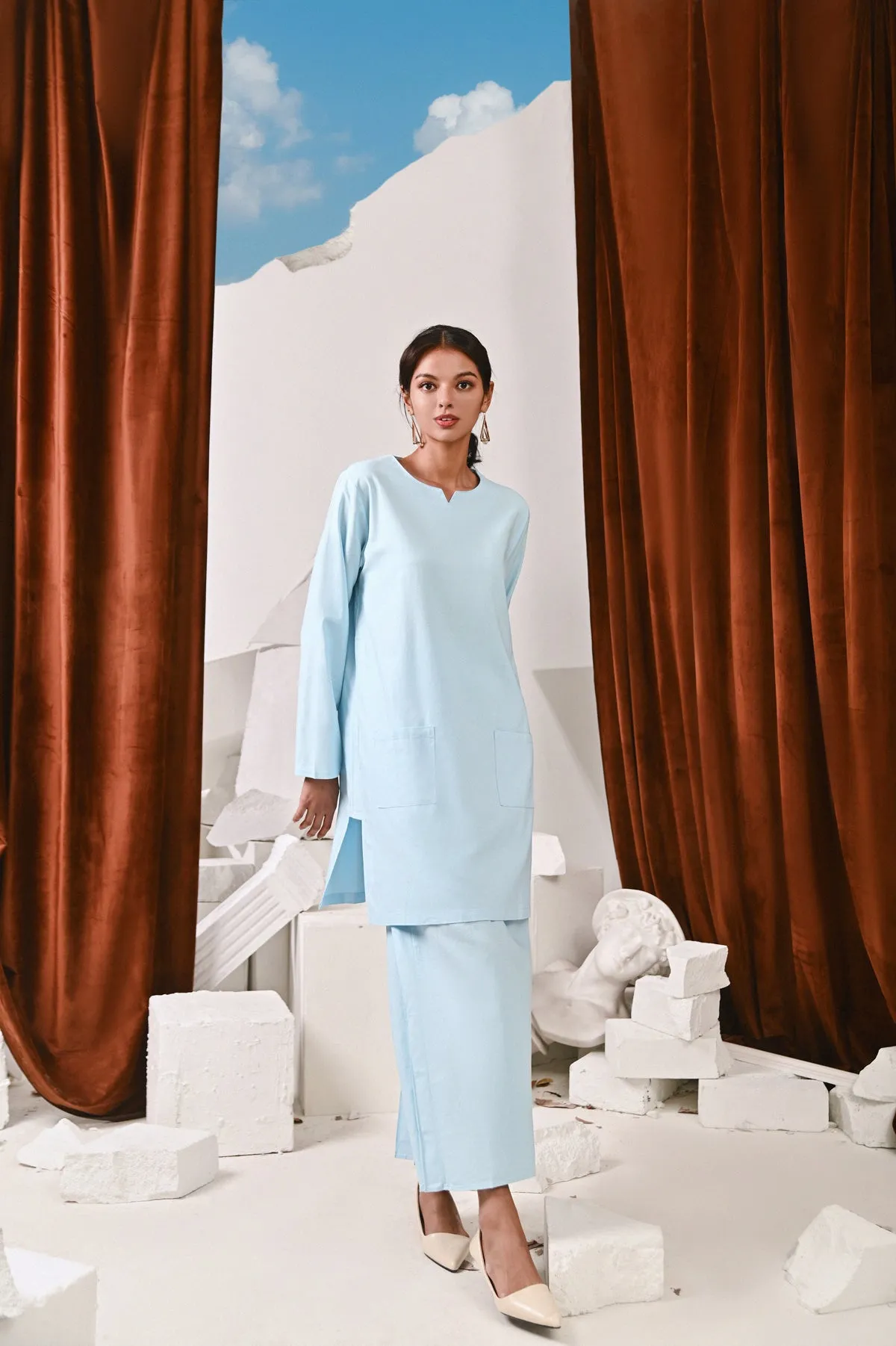 The Kita Menang Women Back Pleats Skirt - Light Blue